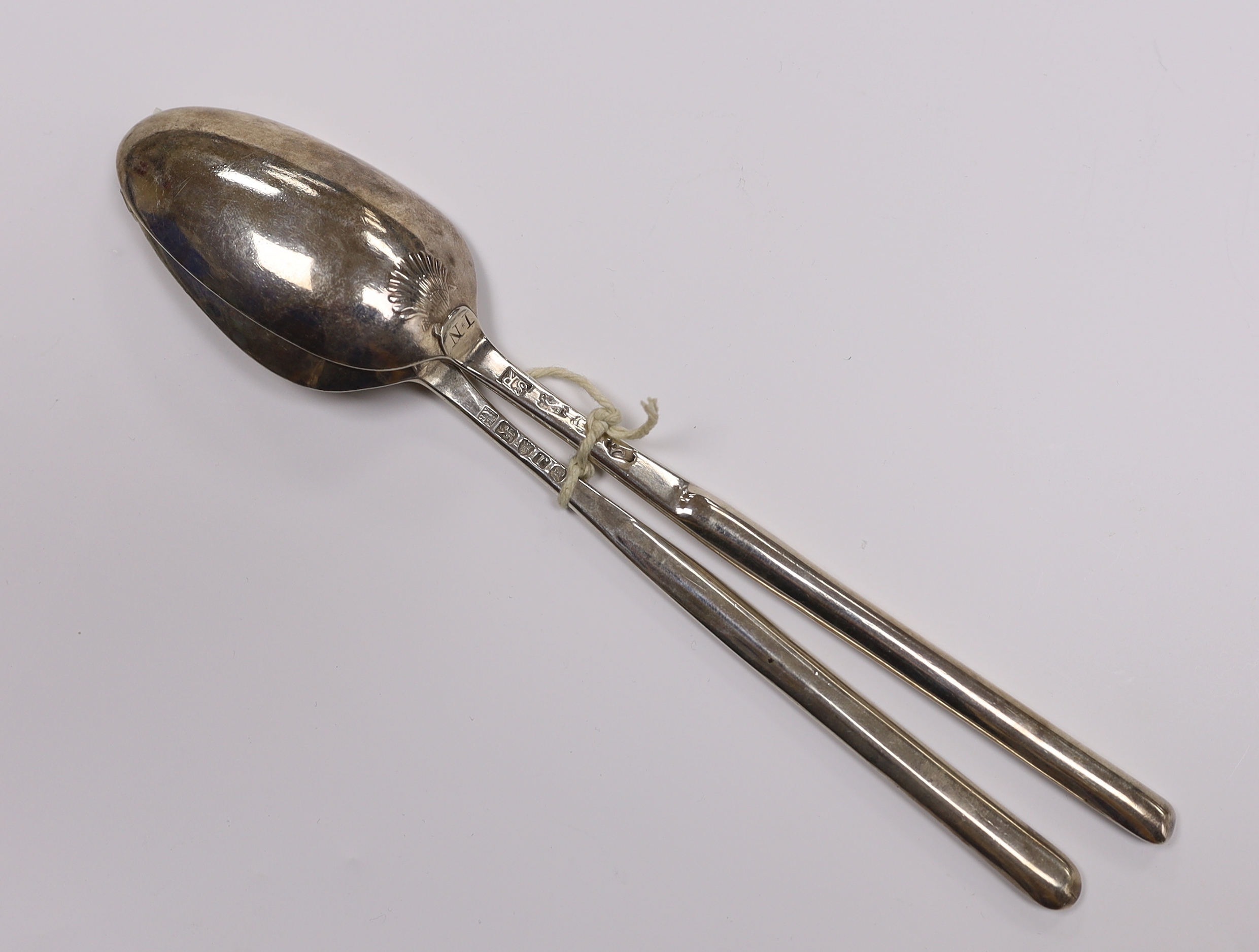 Two 18th century silver combination marrow scoop spoons, shell back by Samuel Roby, London, 1745 and Peter & Ann Bateman, London, 1792, longest 23.1cm, 113 grams.